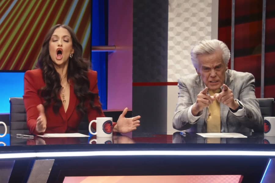 woman yelling and a man angrily grimacing and pointing