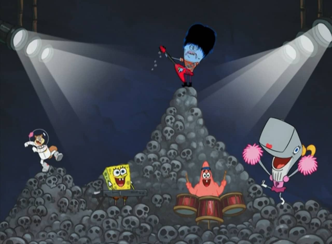 the gang rocking on a mountain of skulls
