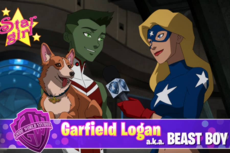 Supergirl interviewing Beast Boy who is holding a dog
