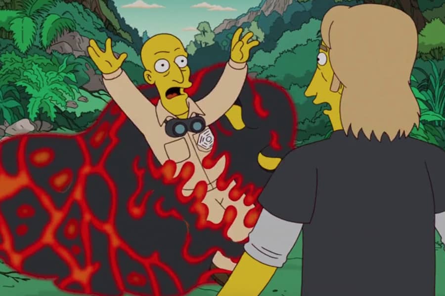 a man looks on in horror as another man is taken away by a lava monster