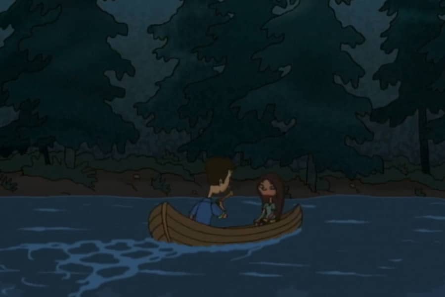 young boy and girl in a canoe on a lake