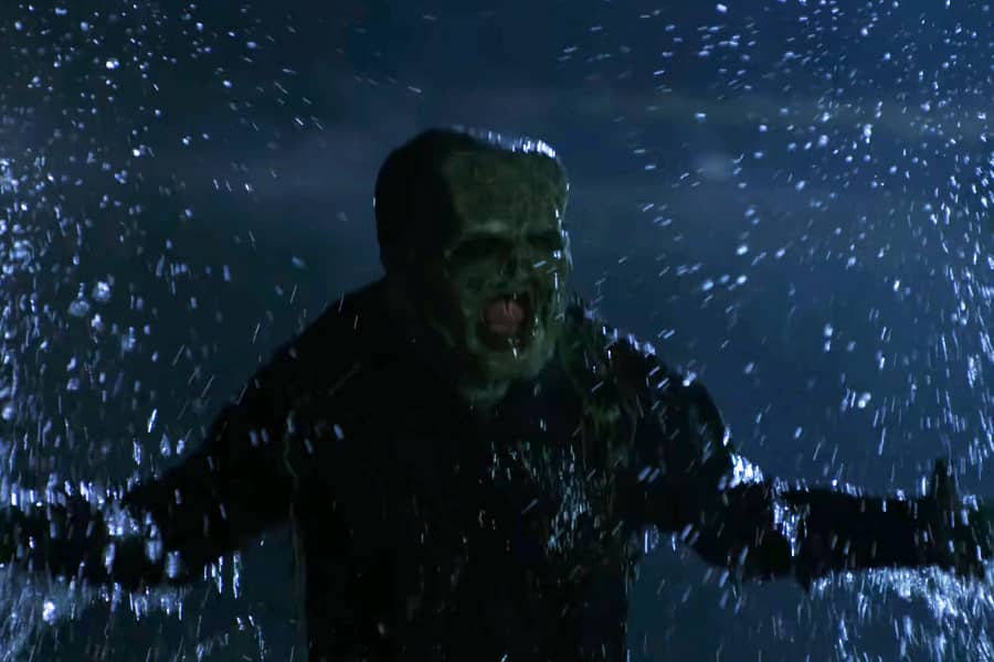 swamp monster splashing out of the water
