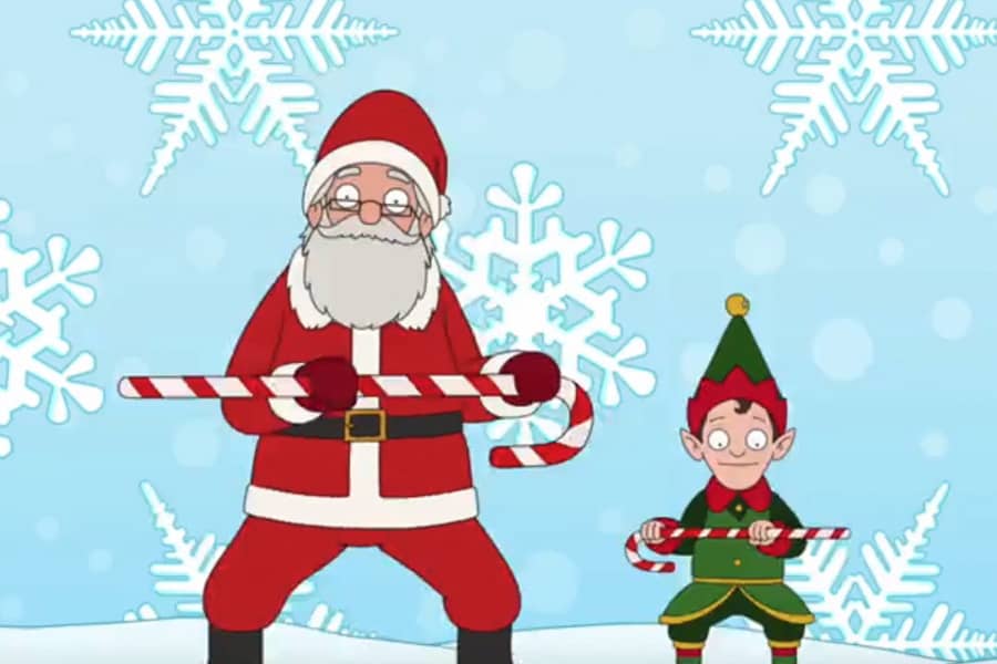 Santa and the elf dancing with big candy canes