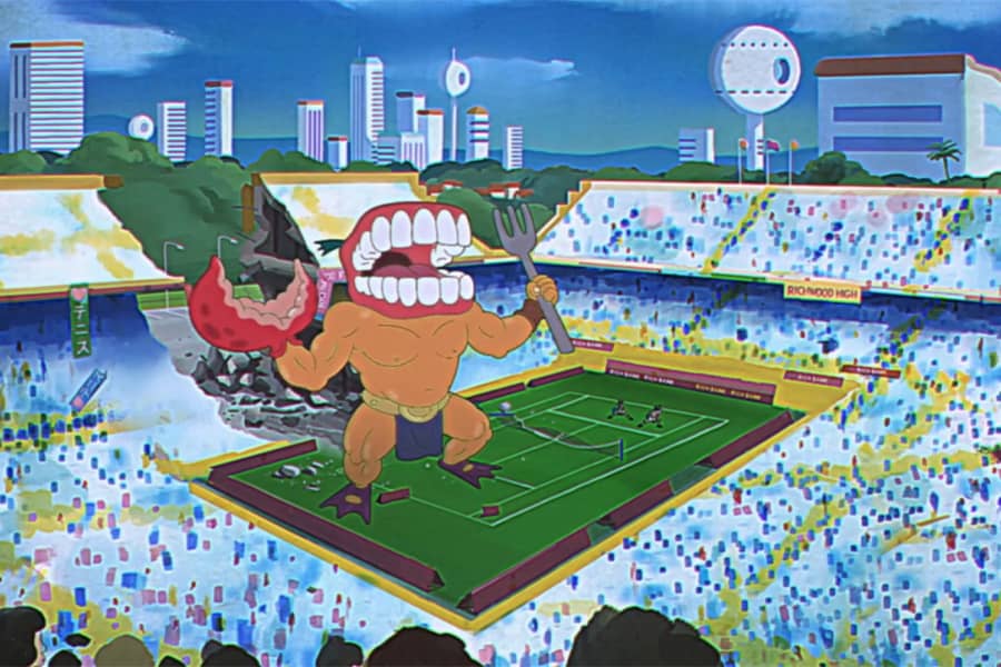 giant monster on the football field with a lobster claw and its head is a giant set of teeth