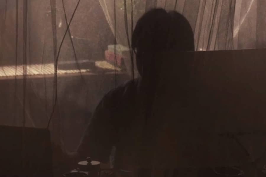 Erlich Bachman obscured by curtain and shadow