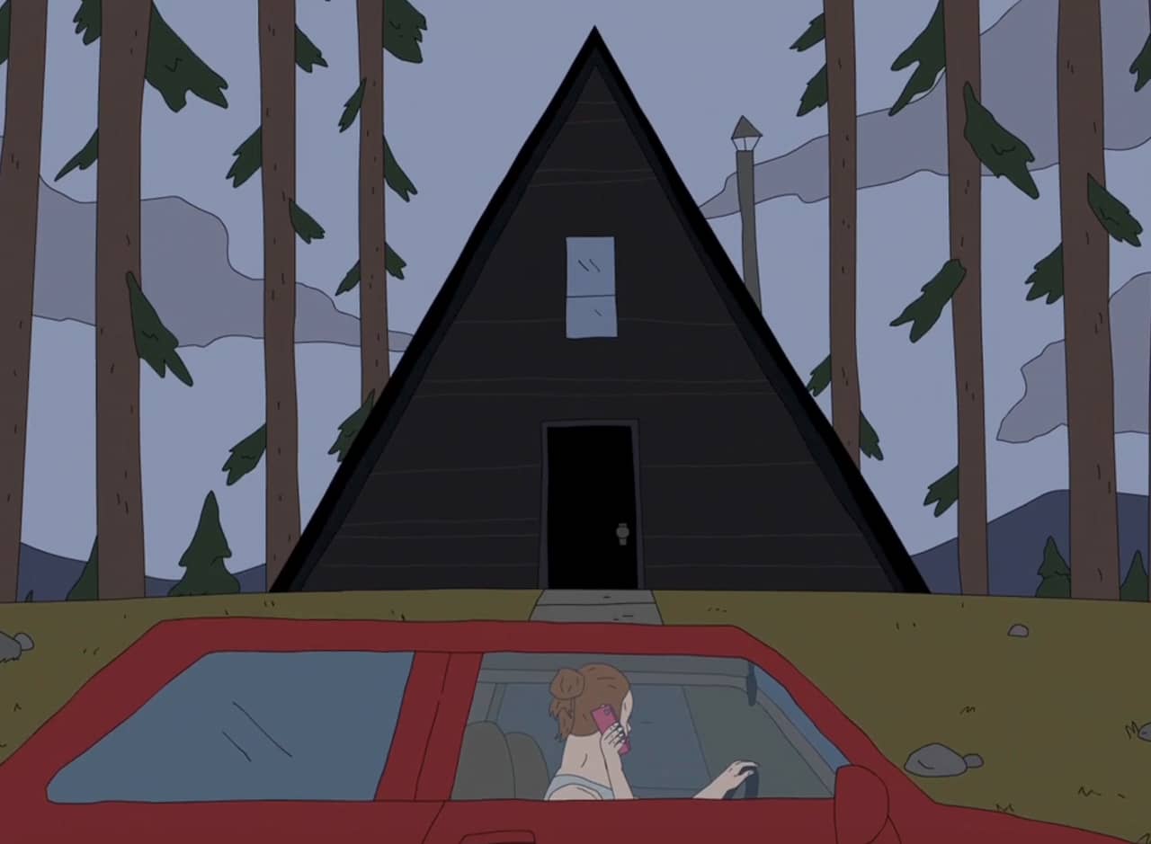 woman in her car looks at a dark A-frame cabin in the woods