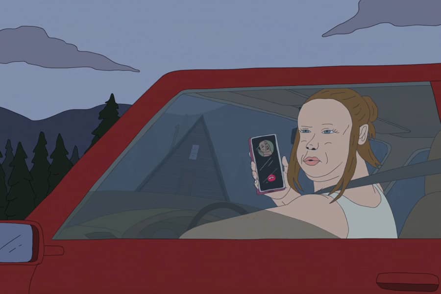 the woman talking on the phone and looking out her car window