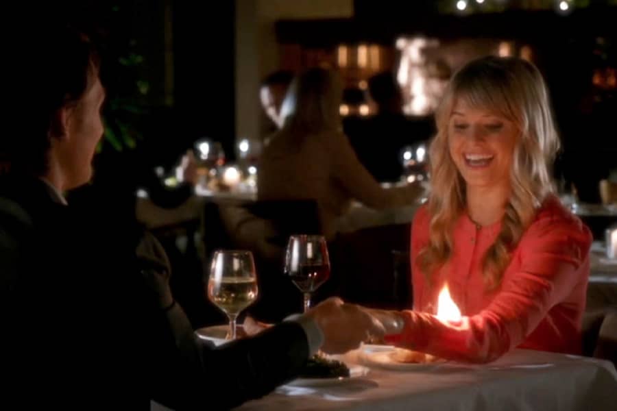 Nick and Nicki at dinner and her arm is on fire