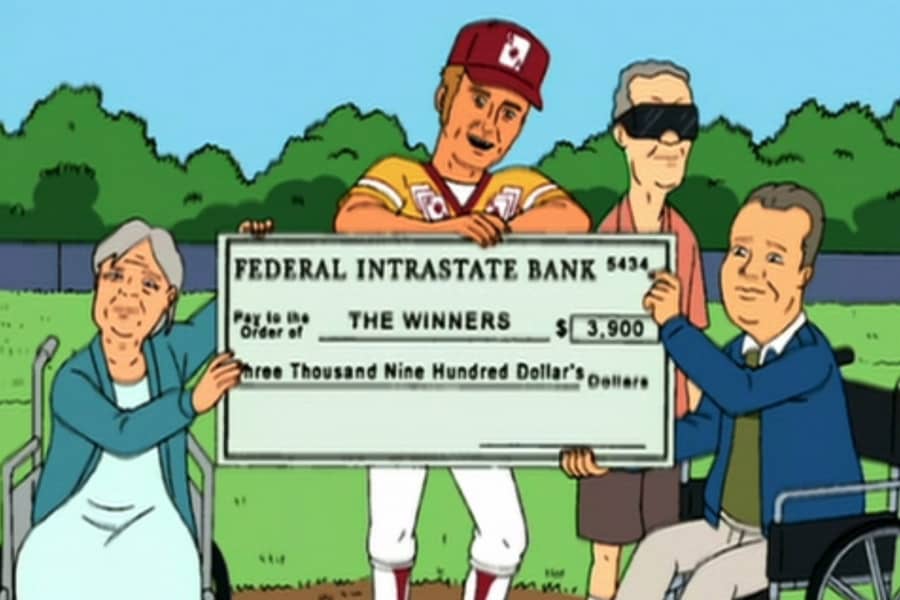 The Ace with a giant novelty check and three elder folks
