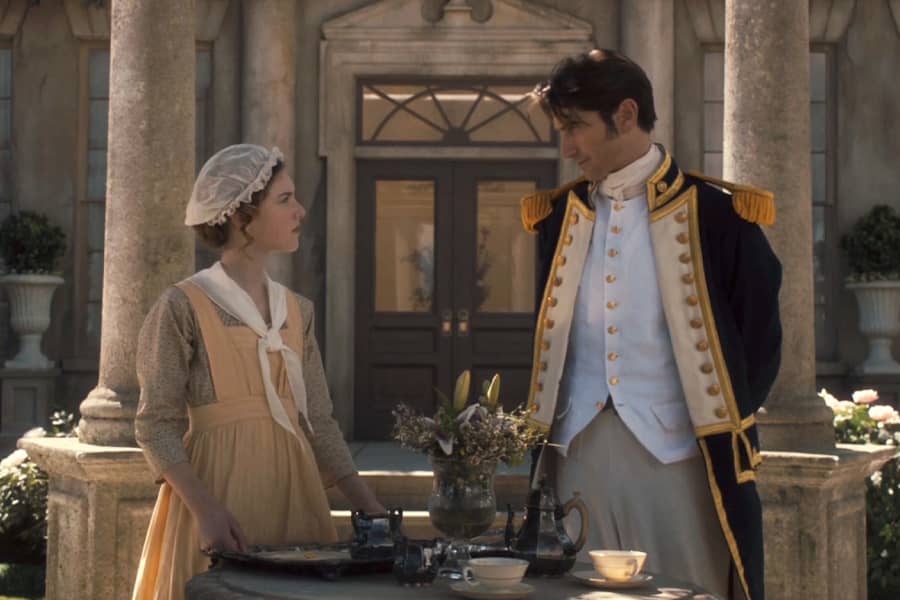 The Admiral speaks with a young girl