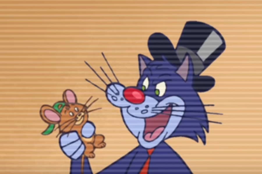 Scamper holding Bitey