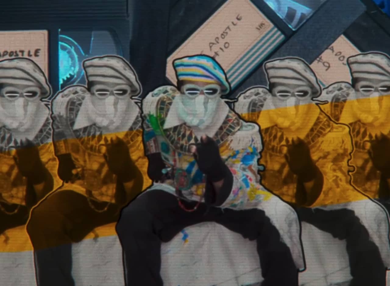 The Apostle, a masked man in colorful clothing