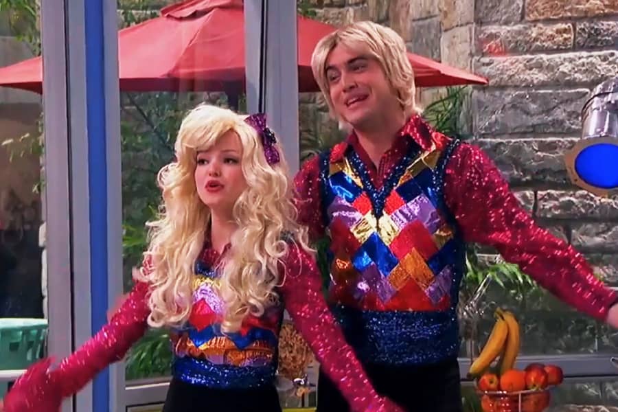Billie and Bobbie wearing glittery plaid vests