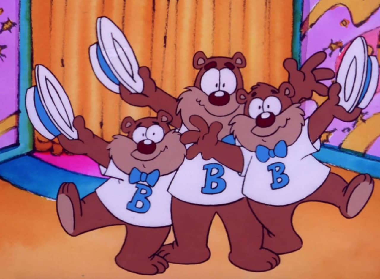 the Buddy Bears, three bears in bowties and hats