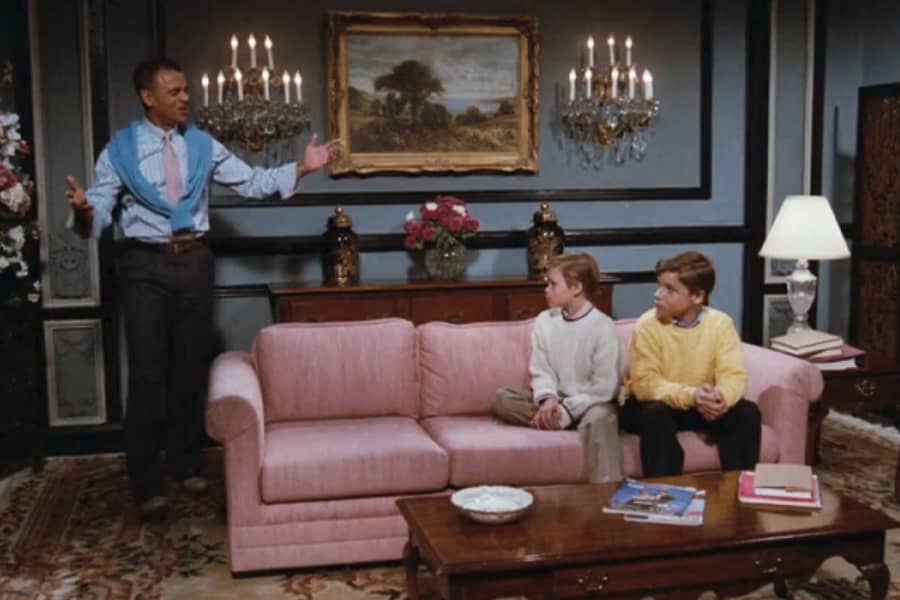 Buddy talks to the boys on the couch