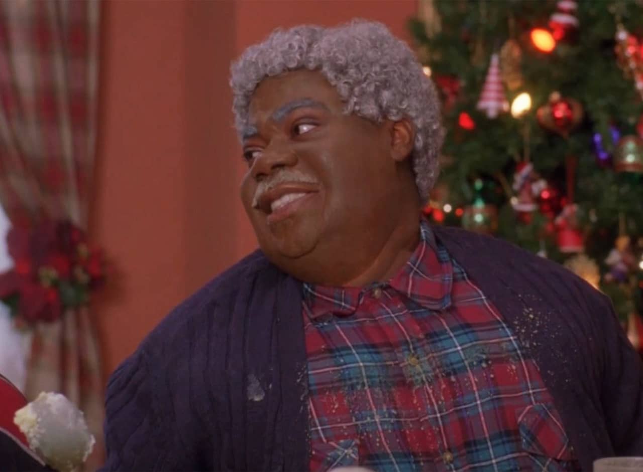 Tracy Jordan as Grandpa Chunk at the Christmas dinner table