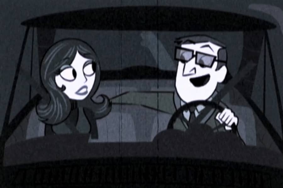 man and woman driving in the car