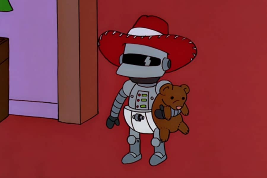 baby robot with a teddy bear and a cowboy hat