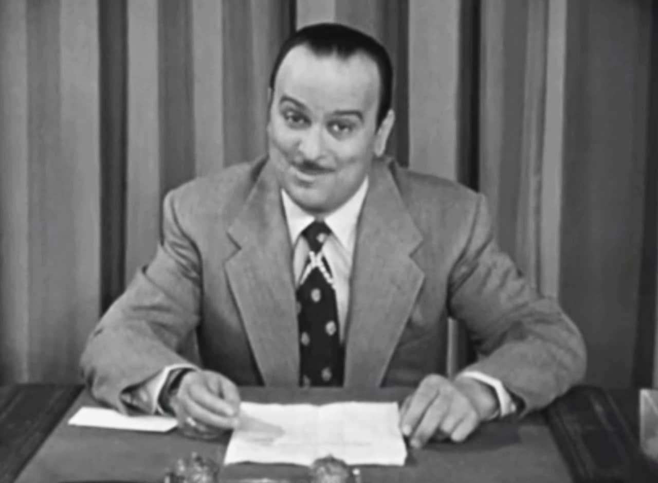 Dickie Davis at his desk