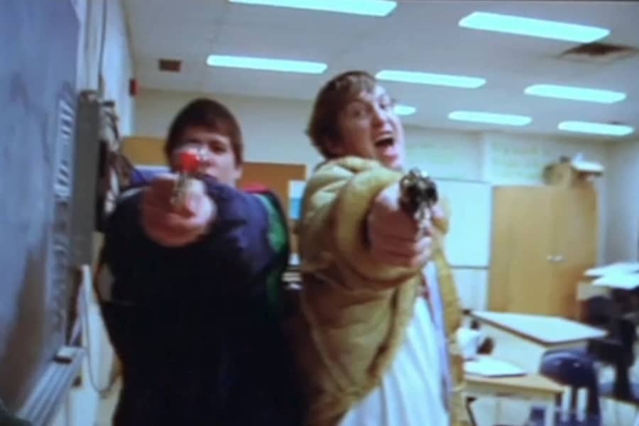 Owen and Matt pointing guns