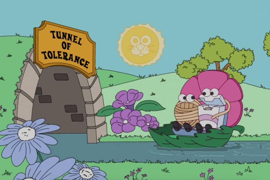 a spool of yarn and a box of floss go into the Tunnel of Tolerance in little boat