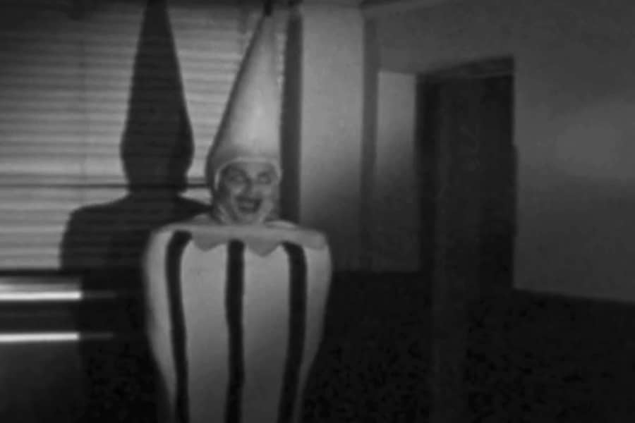creepy man dressed as a pencil
