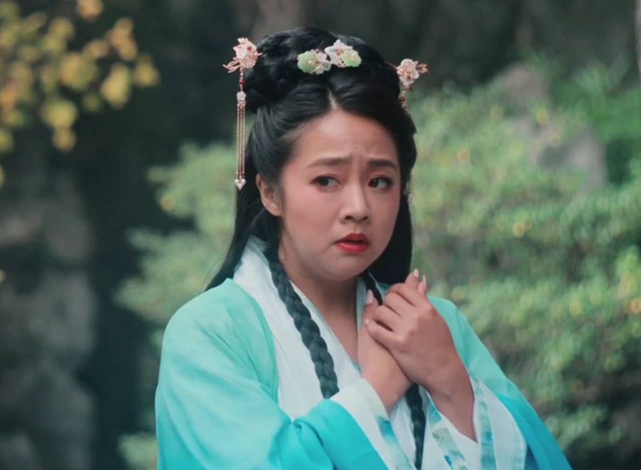 Katherine Huang as Chunhwa, dressed in traditional Chinese clothing