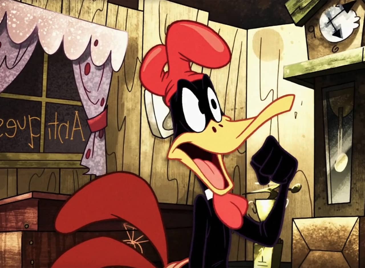 Daffy Duck as Foghorn Leghorn, wearing a costume featuring rooster comb, wattles, and tail