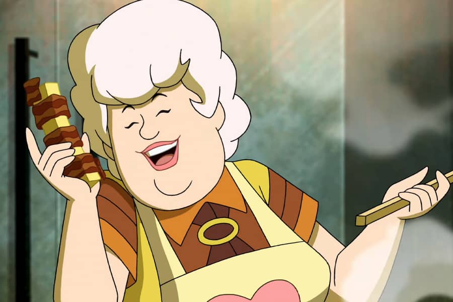 Francilee laughing, holding a bacon-wrapped stick of butter