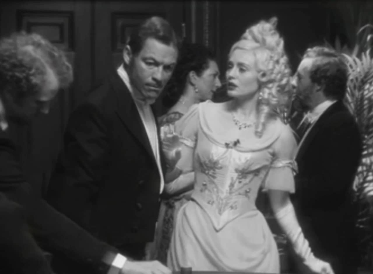 Guy Dexter as Bill and Myrna Dalgliesh as Lady Anne, at a gambling table