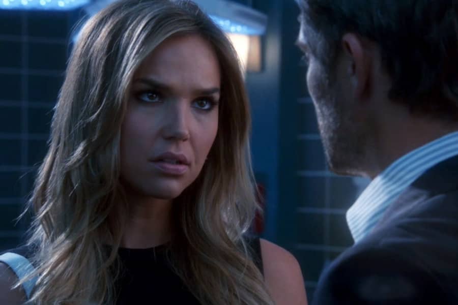 woman lawyer speaks with Rake in the morgue