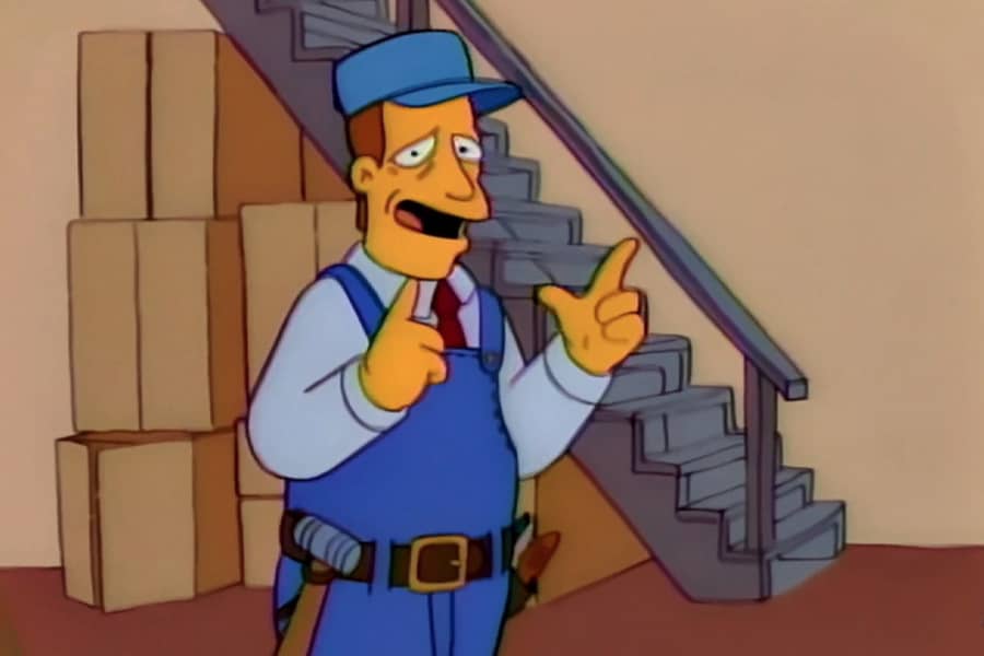McClure in front of some stairs