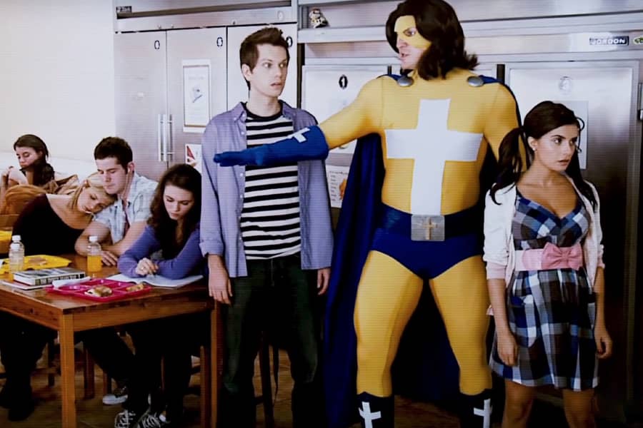 the Holy Avenger with two kids in the cafeteria where the students are asleep