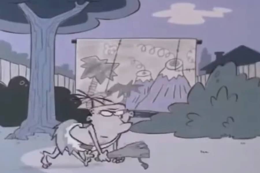 a caveman with a club walking