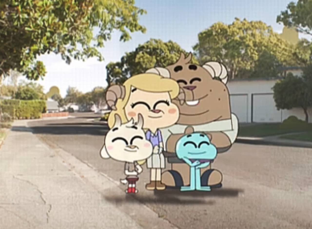 family of goats with grog smiling in the street