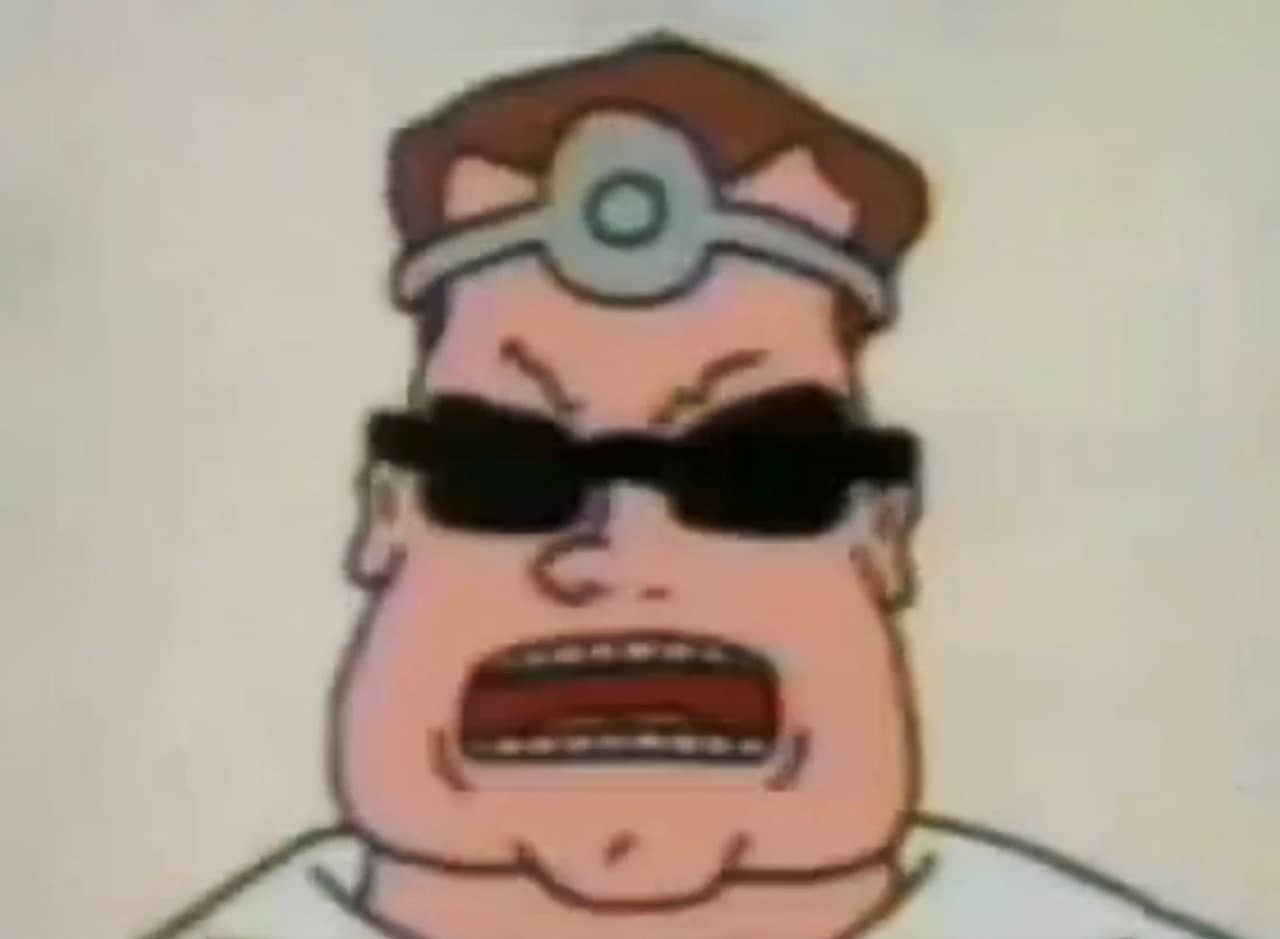 Arnold Schwarzenegger wearing sunglasses and doctor’s head mirror