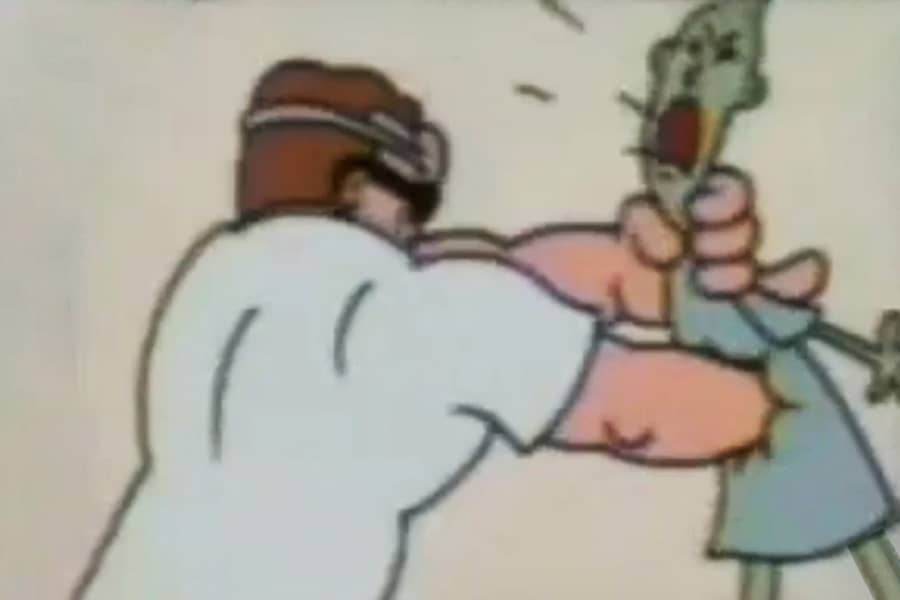 Schwarzenegger punching into the alien’s torso