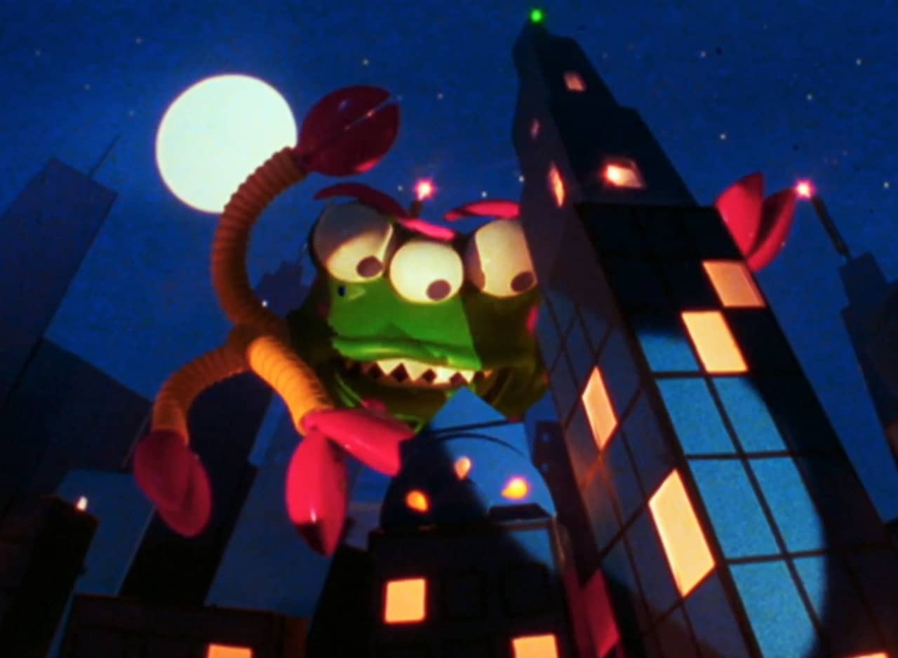 a giant bug with multiple legs, three eyes, and sharp teeth climbs skyskrapers in a city at night