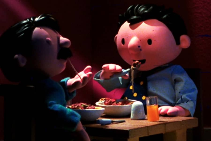 closeup of the men eating