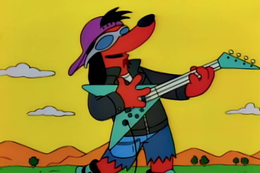 Poochie playing an electric guitar