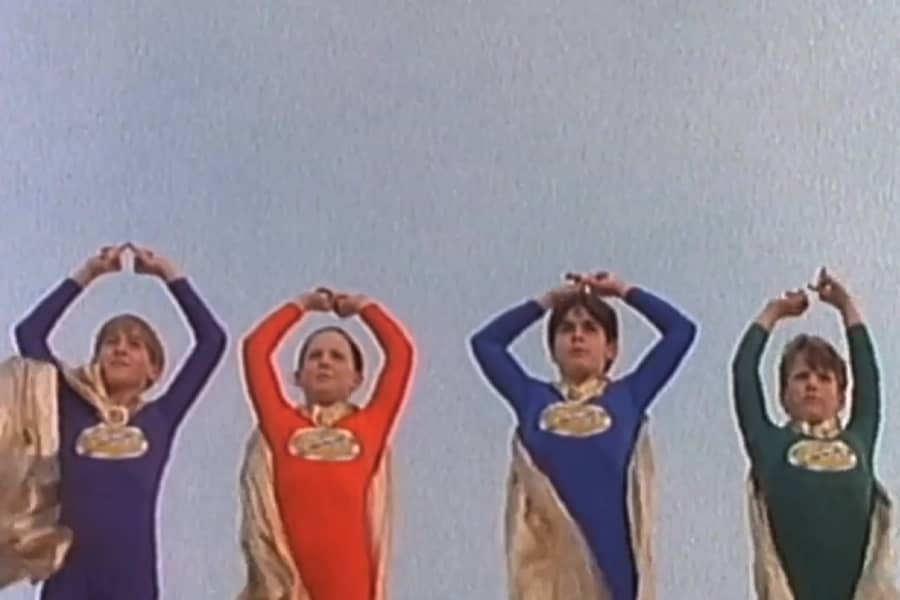 The Junior Defenders doing their hand signal