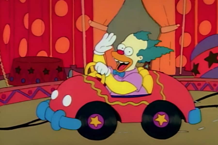 Krusty driving a litle circus car