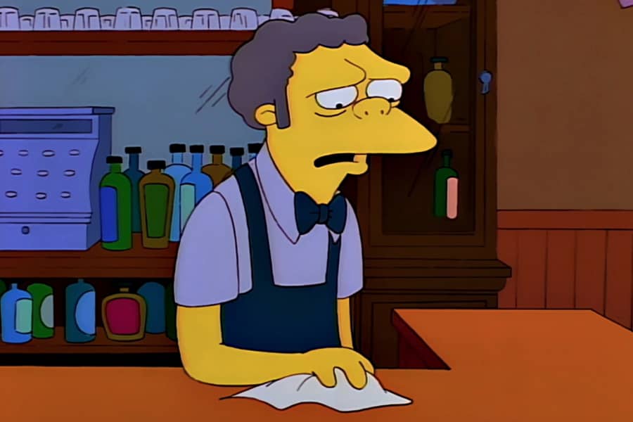 Moe cleaning the bar looking sad