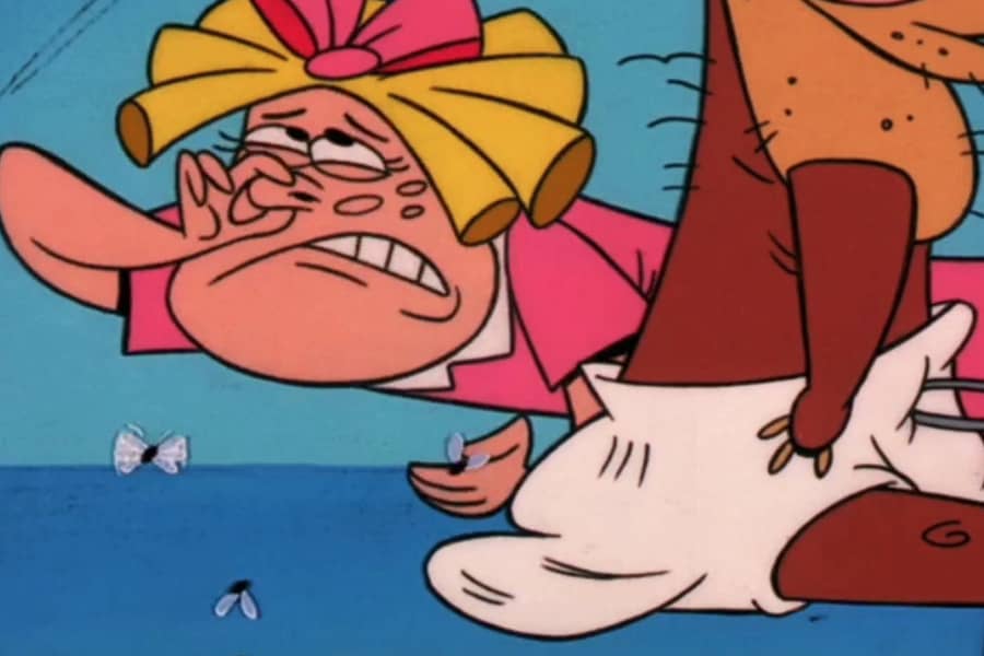 girl pinching her nose next to Manure the Bear’s diaper