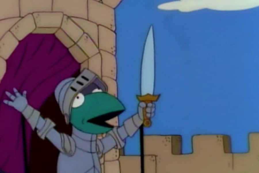 Kermit in knight’s armor holding a sword