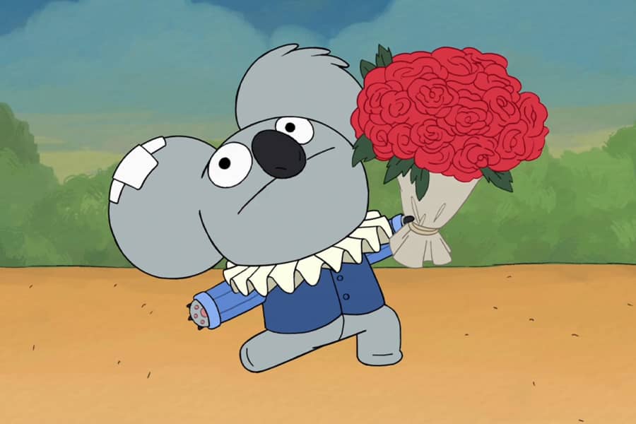 Nom Nom dressed as Romeo holding a bouquet of roses