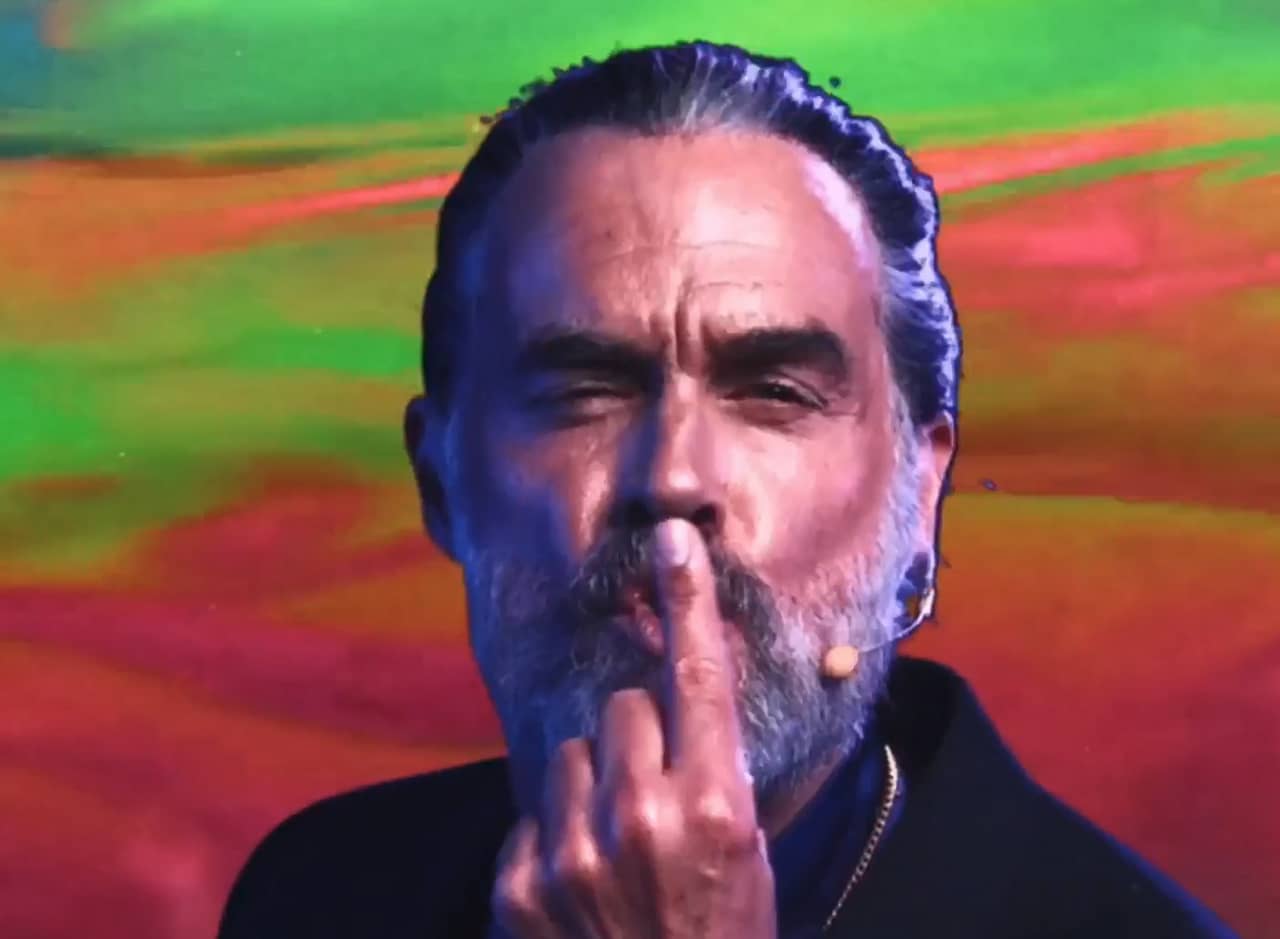 Plutonovich kissing his index finger