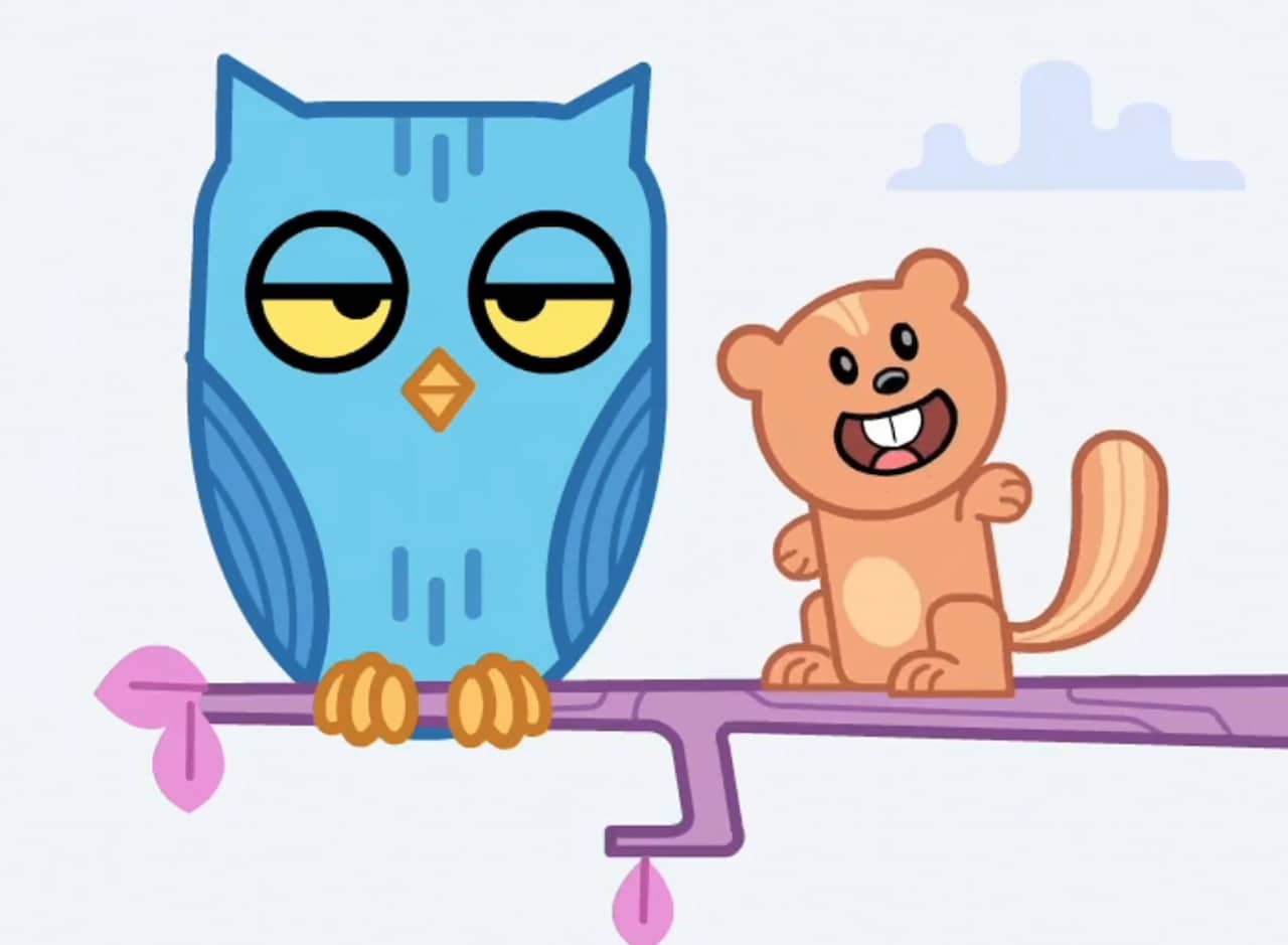 a blue owl and brown squirrel on a branch