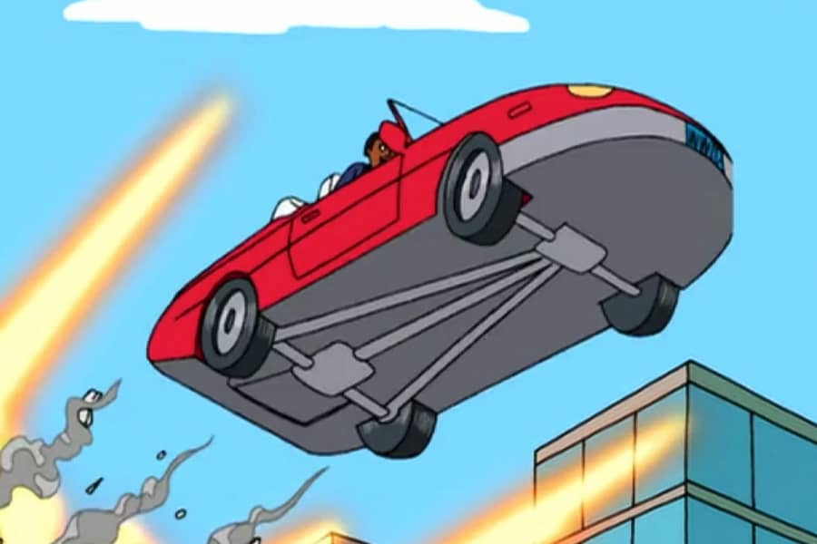 the convertible makes a big jump in front of an explosion