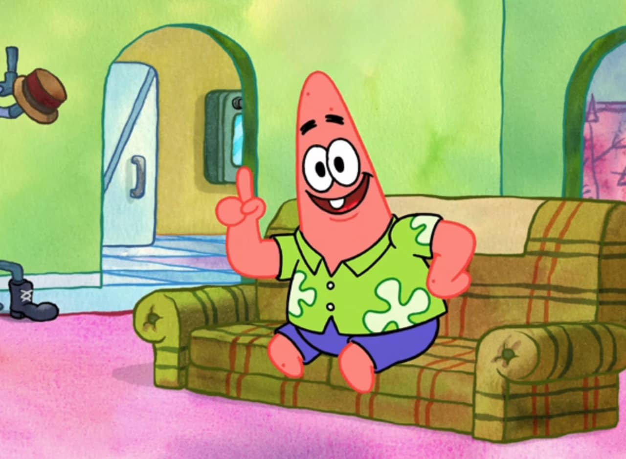 Patrick Star sitting on a plaid couch